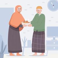 compartilhando comida de cetupat com o idoso em eid