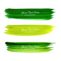 Conjunto de design de traçados de pincel aquarela verde vetor