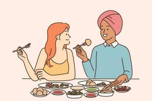indiano homem e caucasiano mulher estão sentado às jantar mesa degustação tradicional indiano cozinha com especiarias. multicultural casal tendo jantar juntos dentro restaurante degustação nacional pratos vetor