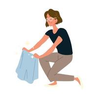 mulher limpando com pano vetor