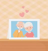 idosos, casal fofo, avós, porta-retratos na mesa vetor