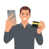 sorridente homem detém inteligente telefone e crédito cartão, ele gesto sucesso para ganhar dinheiro recompensa. vetor