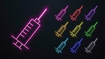 uma conjunto do brilhante néon ícones do seringas para injeções do diferente cores. vetor