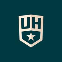 inicial Uh logotipo Estrela escudo símbolo com simples Projeto vetor