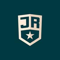 inicial jr logotipo Estrela escudo símbolo com simples Projeto vetor