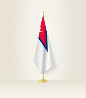 Nepal bandeira em uma bandeira ficar em pé. vetor