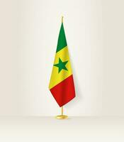 Senegal bandeira em uma bandeira ficar em pé. vetor