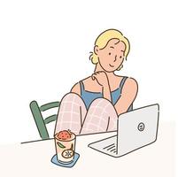uma garota está sentada confortavelmente em casa e olhando para um laptop. vetor