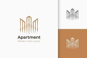 logotipo imobiliário em forma de edifício representa hotel ou apartamento vetor