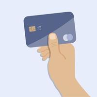 cartão de plástico na mão, pagamento sem dinheiro, crédito vetor