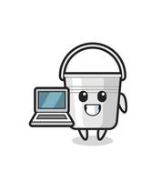 ilustração de mascote de balde de metal com um laptop vetor