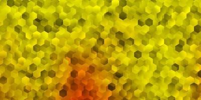 layout de vetor amarelo claro com formas de hexágonos.