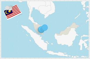 mapa do Malásia com uma fixado azul alfinete. fixado bandeira do Malásia. vetor