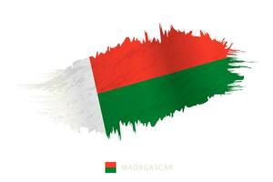 pintado pincelada bandeira do Madagáscar com acenando efeito. vetor