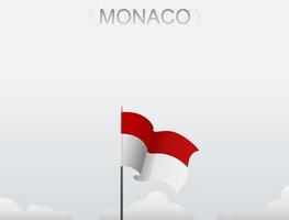 bandeira de Mônaco voando sob o céu branco vetor