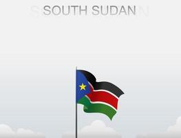 bandeira do Sudão do Sul voando sob o céu branco vetor