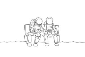 uma única linha desenhando dois jovens astronautas felizes sentados no sofá e jogando videogame na ilustração gráfica do vetor da superfície da lua. conceito de espaço sideral do cosmonauta. design moderno de desenho de linha contínua