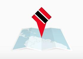 trinidad e tobago é retratado em uma guardada papel mapa e fixado localização marcador com bandeira do trinidad e tobago. vetor