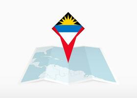 Antígua e barbuda é retratado em uma guardada papel mapa e fixado localização marcador com bandeira do Antígua e barbuda. vetor