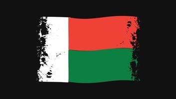bandeira ondulada do país de madagascar. vetor