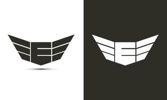 e logotipo dentro Preto e branco cor com asas e escudo vetor