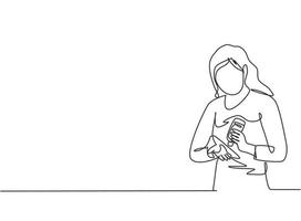 Um único desenho a linha de uma mulher derrama desinfetante para as mãos nas palmas das mãos para evitar bactérias e ser mais higiênicas. autoproteção contra vírus corona. ilustração em vetor gráfico de desenho de uma linha.