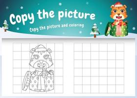 copie o jogo de imagens para crianças e a página para colorir com um tigre fofo usando uma fantasia de natal vetor