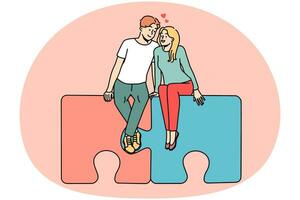 casal feliz sentado em quebra-cabeças abraçando. homem e mulher sorridentes abraçam encontram o amor juntos. relacionamento e afeto. ilustração vetorial. vetor