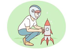 pequeno Garoto perto brinquedo foguete tocam Como astronauta, querendo para trabalhos dentro espaço indústria. vetor imagem