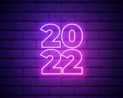 2022 quadro indicador de néon. feliz Ano Novo. números de néon rosa realistas na parede de tijolo escuro. vetor 2022 em estilo linear de néon.