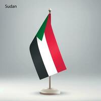 bandeira do Sudão suspensão em uma bandeira ficar em pé. vetor
