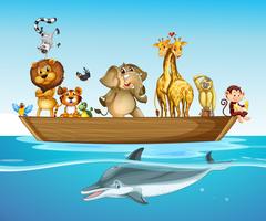 Animais selvagens no barco no mar vetor
