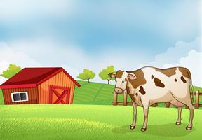 Uma vaca na fazenda com uma casa de celeiro vetor