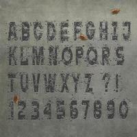 letras do alfabeto grunge e números na parede de concreto, conjunto de vetores