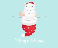 hipopótamo fofo com chapéu de Papai Noel para vetor de ilustração premium de feliz natal