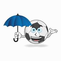 personagem de mascote de bola de futebol segurando um guarda-chuva. ilustração vetorial vetor