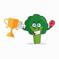 o personagem mascote de brócolis ganha um troféu de boxe. ilustração vetorial vetor