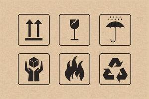 conjunto de ícones de embalagem de sinal e símbolo de cuidado frágil em fundo de papelão marrom. vetor. vetor