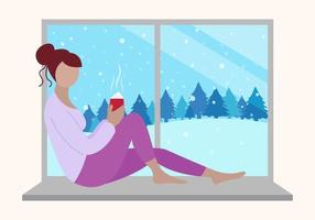 dia de inverno com neve. mulher sentada com uma caneca quente na janela e olhando para a floresta. fundo de inverno. ilustração em vetor plana conceito
