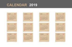 calendário 2019 - conjunto de calendário mensal em papel pardo e fundo branco de madeira. vetor. vetor