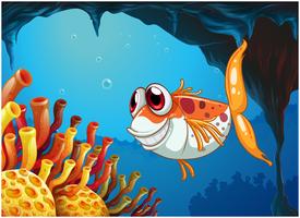 Um peixe sorridente sob o mar dentro da caverna vetor