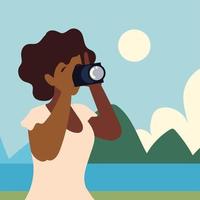 mulher afro-americana com câmera vetor