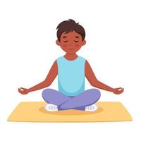 rapaz meditando na posição de lótus. ioga e meditação para crianças