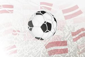 nacional futebol equipe do Letônia marcou meta. bola dentro objetivo líquido, enquanto futebol apoiantes estão acenando a Letônia bandeira dentro a fundo. vetor