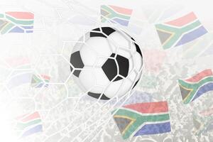 nacional futebol equipe do sul África marcou meta. bola dentro objetivo líquido, enquanto futebol apoiantes estão acenando a sul África bandeira dentro a fundo. vetor