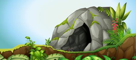 Uma pedra de caverna no fundo da natureza vetor