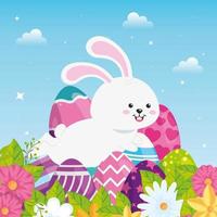 coelho pulando com ovos de páscoa decorado e flores vetor