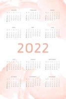Modelo de calendário 2022 em fundo rosa coral desenhado com pinceladas de aquarela. design de calendário para impressão e digital. semana começa no domingo vetor