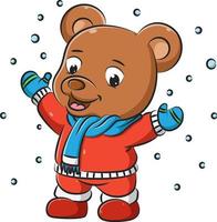 o urso marrom com o suéter vermelho e lenço está brincando na neve vetor
