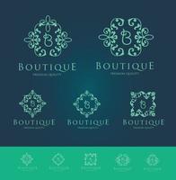 conjunto de logotipo floral da boutique vetor